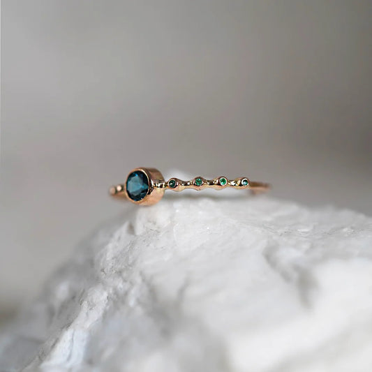 Anillo de Oro con Topacio y Esmeraldas 18k